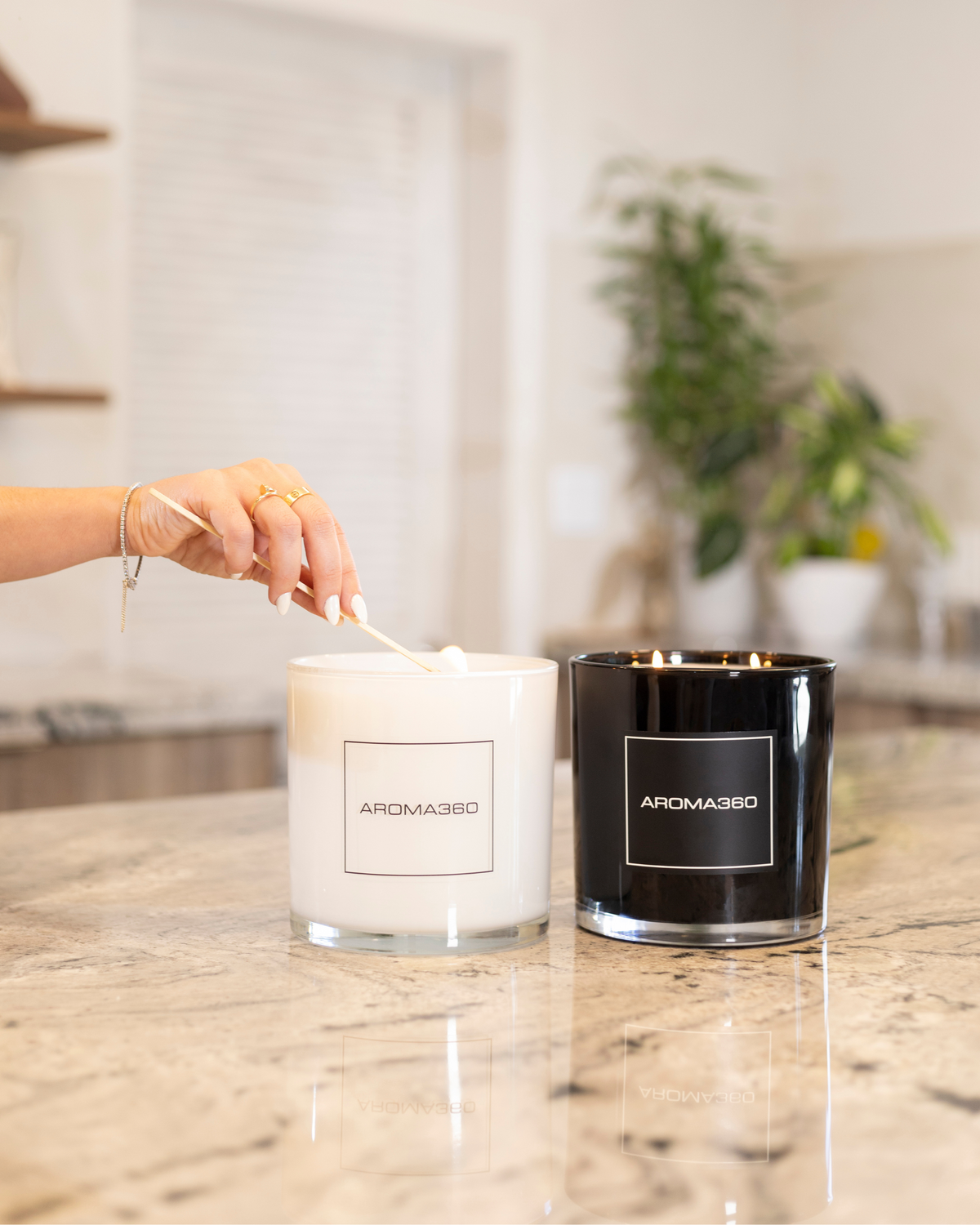 Invigorating 6-wick Ocean Depths candle with fresh oceanic notes, jasmine, and black pepper. A 55oz candle with a 300-hour burn time, creating a refreshing and restorative ambiance.