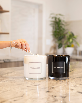 Invigorating 6-wick Ocean Depths candle with fresh oceanic notes, jasmine, and black pepper. A 55oz candle with a 300-hour burn time, creating a refreshing and restorative ambiance.