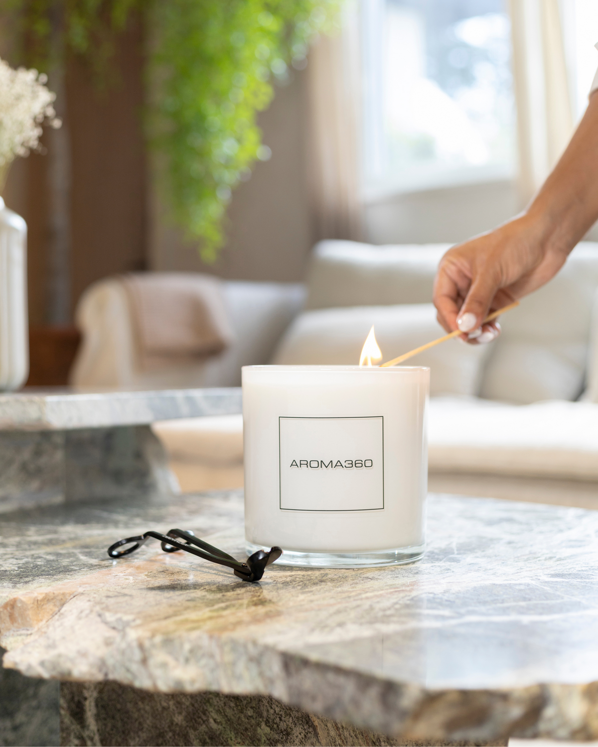 Invigorating 6-wick Ocean Depths candle with fresh oceanic notes, jasmine, and black pepper. A 55oz candle with a 300-hour burn time, creating a refreshing and restorative ambiance.