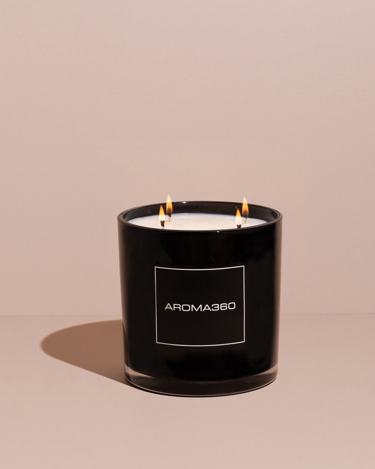 Invigorating 6-wick Ocean Depths candle with fresh oceanic notes, jasmine, and black pepper. A 55oz candle with a 300-hour burn time, creating a refreshing and restorative ambiance.
