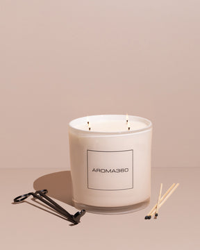 Invigorating 6-wick Ocean Depths candle with fresh oceanic notes, jasmine, and black pepper. A 55oz candle with a 300-hour burn time, creating a refreshing and restorative ambiance.