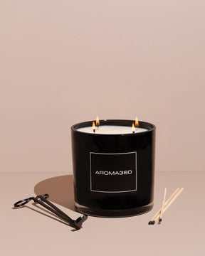 Invigorating 6-wick Ocean Depths candle with fresh oceanic notes, jasmine, and black pepper. A 55oz candle with a 300-hour burn time, creating a refreshing and restorative ambiance.